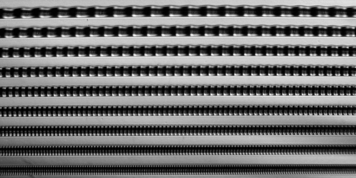 Vinyl record grooves under the miscroscope