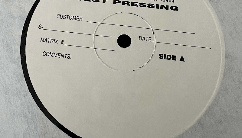 A vinyl record test pressing